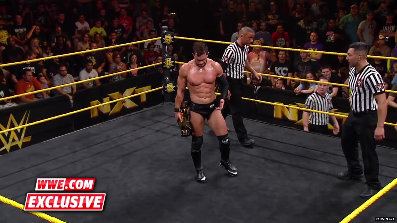 Finn_B_lor_and_Apollo_Crews_are_helped_backstage-_WWE_com_Exclusive2C_Nov__42C_2015_069.jpg