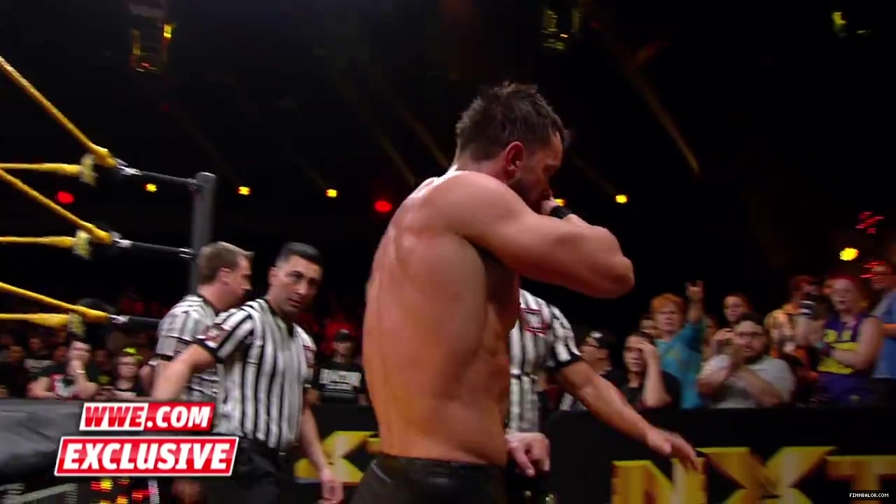 Finn_B_lor_and_Apollo_Crews_are_helped_backstage-_WWE_com_Exclusive2C_Nov__42C_2015_083.jpg