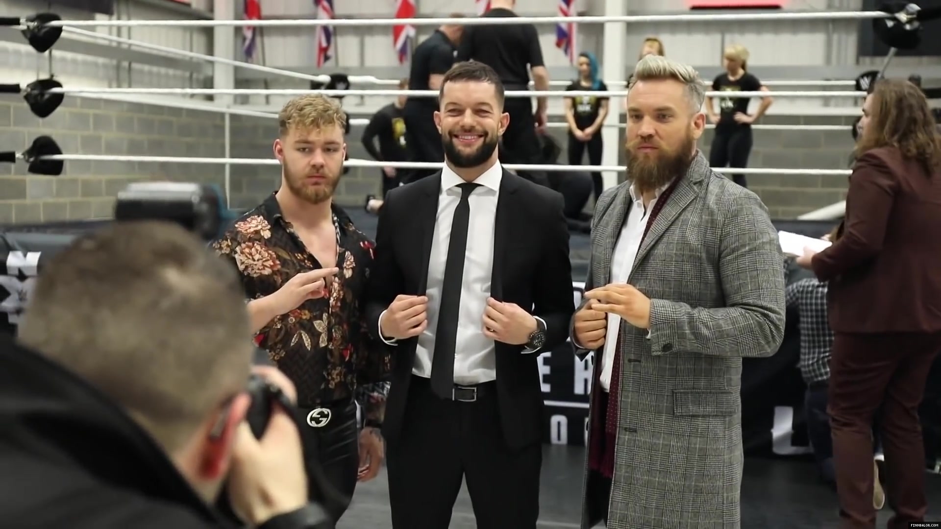 WWE_Superstar_FINN_BALOR_joins_MOUSTACHE_MOUNTAIN_at_the_opening_of_the_NXT_UK_PC_038.jpg